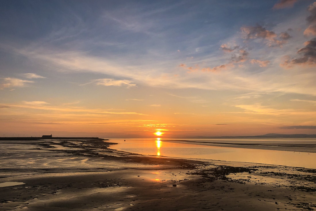 Sunset over the estuary in Morecambe Bay