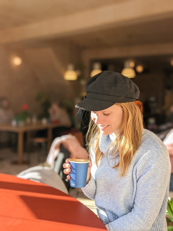 Chloe having a capuccino at A Little Street Kitchen