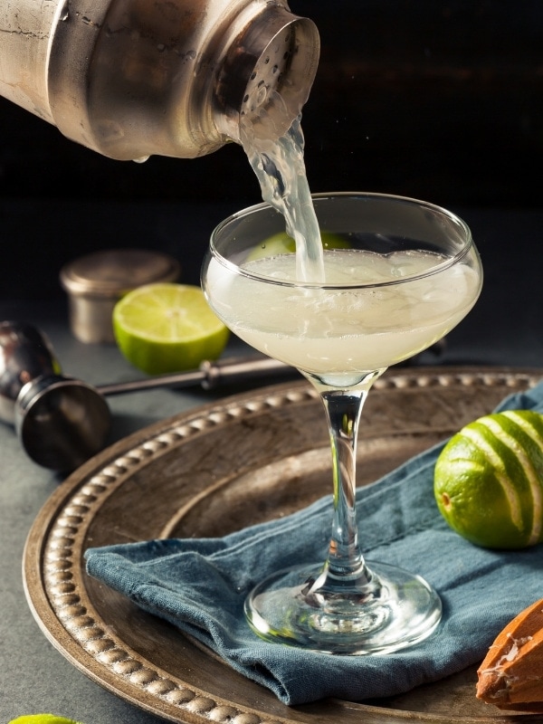 Pouring a Gimlet cocktail