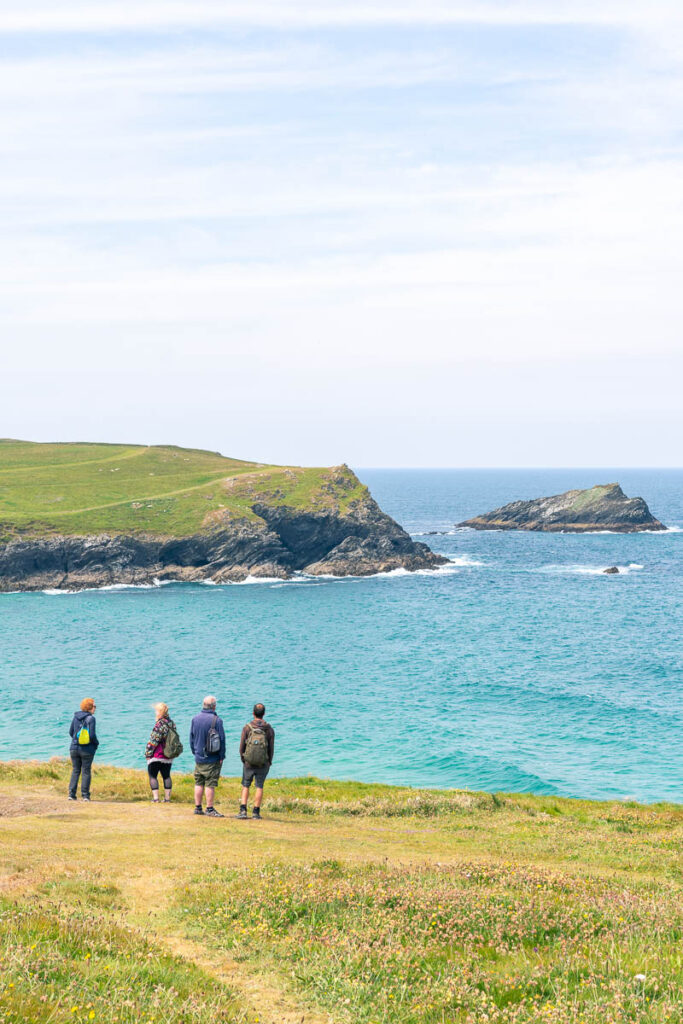 walkers on the south west coast path in cornwall