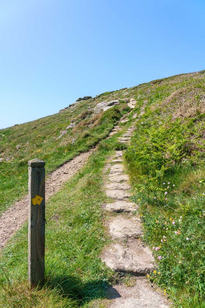 yellow arrow up the hill